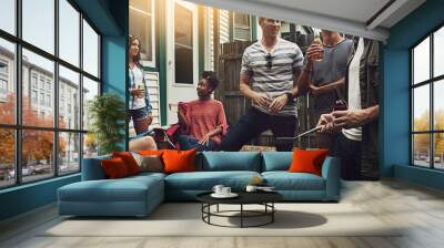 Friends, people and beer in backyard with bbq for social event, party and celebration with laughing in home. Group, drinking alcohol and food with relax, conversation or diversity at barbecue reunion Wall mural