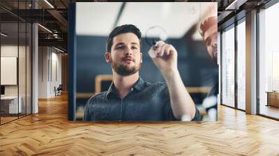 Glass board, business people and men with teamwork, brainstorming and planning for project development. Innovation startup, coworkers or entrepreneurs in modern office, cooperation or review for idea Wall mural