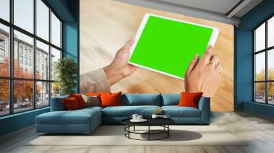 Green screen, hands and tablet with business person at desk of office for email, feedback or report. Advertising, marketing and technology with corporate employee in professional workplace closeup Wall mural