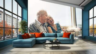 Happy, elderly couple and laughing on coffee date in restaurant for bonding, comedy and funny joke in retirement. Smile, senior man and woman with bokeh and morning espresso for relax and humour Wall mural