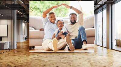 Happy black family, portrait and roof with protection for mortgage, investment or moving in new home. African mother, father and child with smile for shelter, property or house loan in living room Wall mural