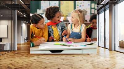 Happy children, drawing and coloring with classmates in kindergarten for fun activity in classroom. Group of young elementary kids sketching colorful paper, poster or sign for learning or development Wall mural