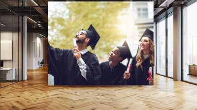 Happy students, graduates and selfie with certificate for graduation memory, photography or celebration at university. Young, people and friends with smile for picture, academic achievement or degree Wall mural