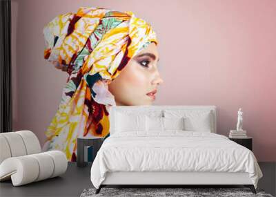 Hijab, profile and thinking with woman in studio for islamic fashion, arabic culture or modest clothes. Raya, eid Mubarak celebration and elegance with muslim person on background for oriental design Wall mural