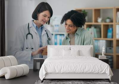 Hospital, tablet and doctor with woman for consulting, medical service and help in clinic. Healthcare, telehealth and person with patient on digital tech for diagnosis, online results and insurance Wall mural