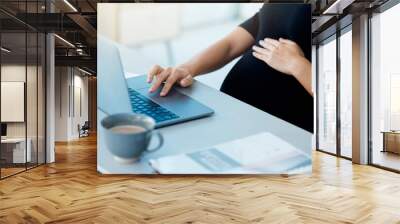 Laptop, hands and pregnant employee, typing and closeup of woman, working and publicist in PR agency. Office, research and online for news of election, digital and writing of speech and mother Wall mural