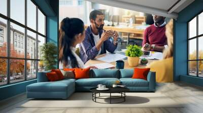 Man, business people and startup with paperwork in discussion, meeting and planning in modern office. Teamwork, documents and diversity with conversation, problem solving and group at creative agency Wall mural