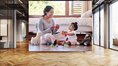 Mom, baby and playing on floor in house for love, development or bonding together with toys. Mother, toddler and fun in apartment bedroom for growth, wellness and learning with teddy bear or game Wall mural