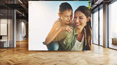 Mother, girl and nature for piggy back with happiness, bonding on vacation in Australia. Female person, child and smile for learning or development in garden, cheerful in countryside with sunshine Wall mural