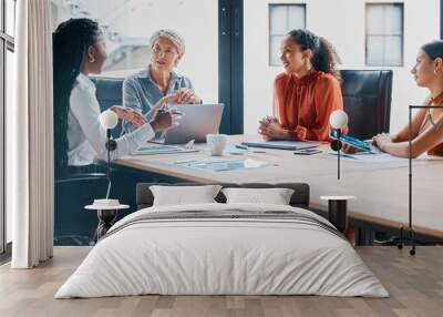 Office, boardroom and business women in meeting for teamwork, collaboration and planning. Corporate workers, diversity and people with laptop for project review, feedback and discussion with manager Wall mural