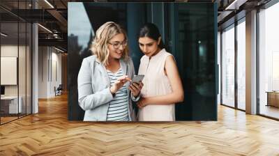 Office, business and people with phone in discussion for research, help or trading report of client. Balcony, teamwork and women with tech in conversation for project, plan or stock market investment Wall mural