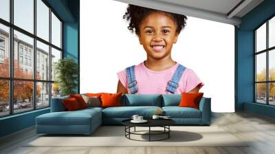 Studio portrait mixed race girl looking standing alone isolated against a yellow background. Cute hispanic child posing inside. Happy and cute kid smiling and looking carefree in casual clothes Wall mural