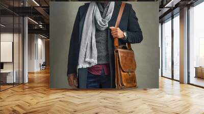 Thinking, suit and man with leather bag in studio isolated on gray background. Fashion, retro and serious model in formal clothes, scarf and vintage style for planning business trip to travel to work Wall mural