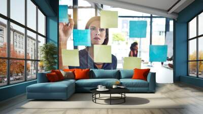 Thinking, writing and business woman planning presentation in office for schedule, goal or team calendar. Agenda, idea or sticky note with creative, vision or research results for storyboard mind map Wall mural