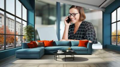 Typing, woman and phone call in office with laptop for work as receptionist, administrative support and multitasking skill. Female employee, online and speaking to confirm appointment and planning. Wall mural