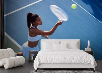 Woman, racket and tennis ball or serving or playing, fitness and training in summer exercise with equipment. Energy, match and competition challenge, active and practice for sport game or workout Wall mural