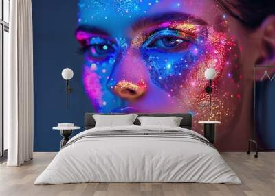 Fashion model woman face with fantasy art make-up. Bold makeup, glance Fashion art portrait, incorporating neon colors Wall mural