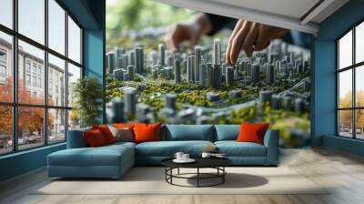 An urban planner interacts with a detailed city model, focusing on sustainable development and green spaces. Wall mural