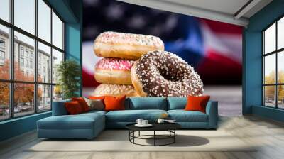 Sweet donuts isolated over waving american fla Wall mural