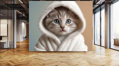 cute fluffy baby kitten in a white coat with a hood on his head Wall mural