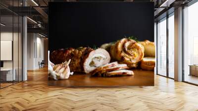 Roll of meat with various spices and herbs Wall mural