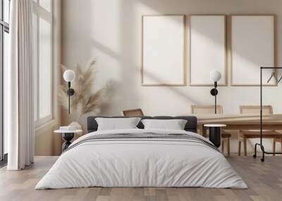 Minimalist dining room interior with wooden table and chairs. three blank frames on the wall. pampas grass in a vase and natural light Wall mural