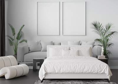 Minimalist living room interior with a white sofa. two empty frames. and a rug Wall mural