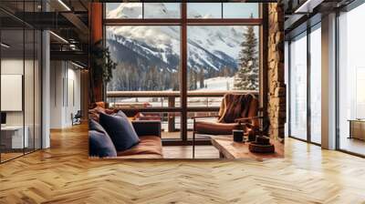 Cozy living room with sofa and panoramic window overlooking the winter mountains and forest Wall mural