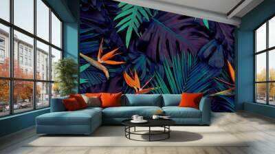 Tropical exotic flower, Closeup of Bird of Paradise or strelitzia reginae bouquet blooming on blue leaves background Wall mural