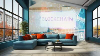 Blockchain theme hud with businessman working on computer on background. Concept of crypto chain. Double exposure. Wall mural