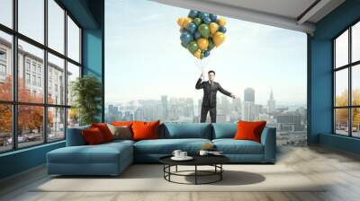 businessman flying Wall mural