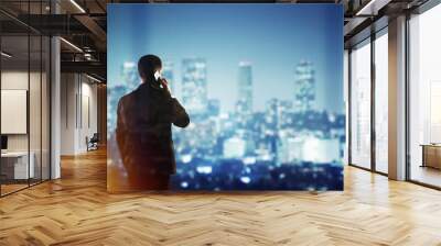 businessman in suit talking on phone Wall mural