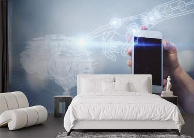 Double exposure of brain sketch hologram and woman holding and using a mobile device. Wall mural