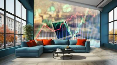 Double exposure of businesswoman hands typing on computer and forex chart hologram drawing. Financial analysis concept. Wall mural