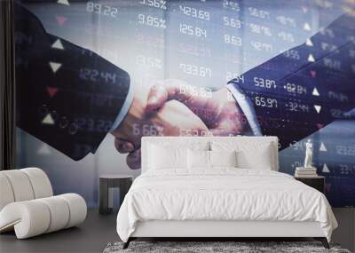 Double exposure of forex graph hologram and handshake of two men. Stock market concept. Wall mural