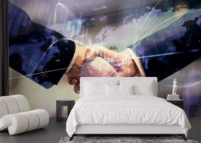 Double exposure of forex graph hologram and handshake of two men. Stock market concept. Wall mural