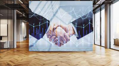 Double exposure of forex graph hologram and handshake of two men. Stock market concept. Wall mural