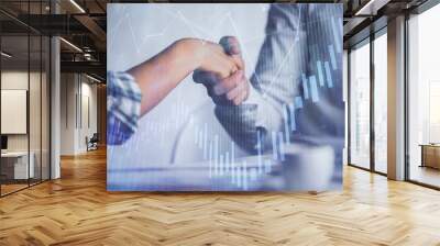 Double exposure of forex graph hologram and handshake of two men. Stock market concept. Wall mural