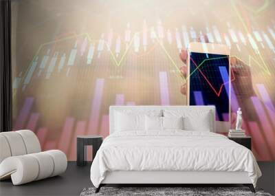 Double exposure of forex graph sketch hologram and woman holding and using a mobile device. Stock market concept. Wall mural