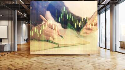 Double exposure of forex graph sketch hologram and woman holding and using a mobile device. Stock market concept. Wall mural