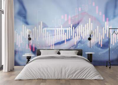 Double exposure of man's hands holding and using a digital device and forex graph drawing. Financial market concept. Wall mural