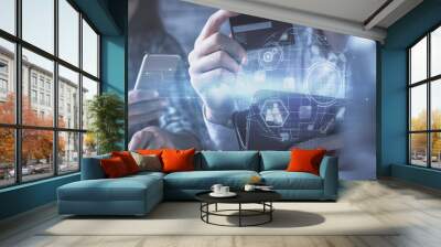 Double exposure of man and woman on-line shopping holding a credit card and social network theme hologram drawing. People connecting and E-commerce pay on-line concept. Wall mural