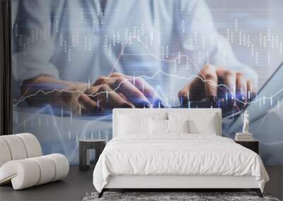 Double exposure of woman hands typing on computer and forex chart hologram drawing. Stock market invest concept. Wall mural