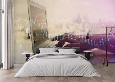 Double exposure of woman hands typing on computer and forex chart hologram drawing. Stock market invest concept. Wall mural