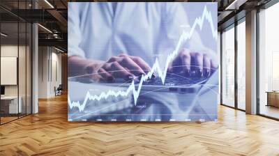 Double exposure of woman hands typing on computer and forex chart hologram drawing. Stock market invest concept. Wall mural