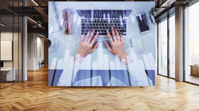 Double exposure of woman hands working on computer and forex chart hologram drawing. Top View. Financial analysis concept. Wall mural