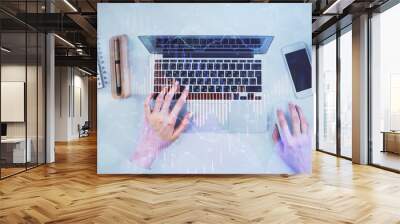 Double exposure of woman hands working on computer and forex chart hologram drawing. Top View. Financial analysis concept. Wall mural