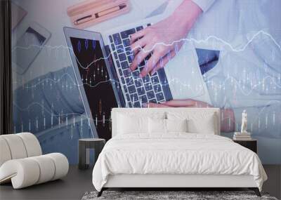 Double exposure of woman hands working on computer and forex graph hologram drawing. Top View. Financial analysis concept. Wall mural