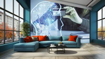 Double exposure of woman on-line shopping holding a credit card and brain hologram drawing. Data E-commerce concept. Wall mural