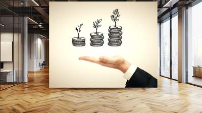 Double exposure with growth coins columns and man hand. Concept of success savings and capital. Wall mural